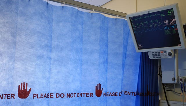 A 'Please Do Not Enter' curtain on a hospital ward