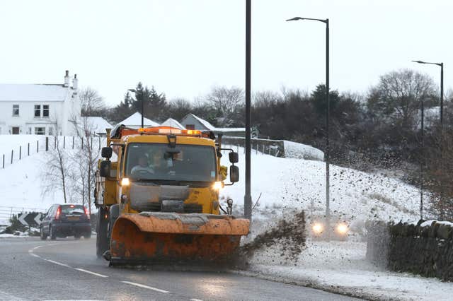 A gritter makes its way through Stirling in central Scotland. (PA)