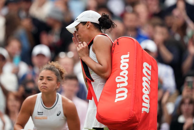 Madison Keys looks dejected as she walks off court