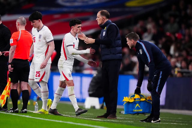 England&rsquo;s Phil Foden with manager Thomas Tuchel after being substituted in the game against Japan