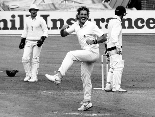 Sir Ian Botham celebrates another wicket