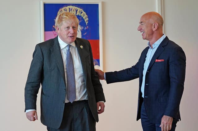 Prime Minister Boris Johnson (left) meets with Amazon founder Jeff Bezos (Stefan Rousseau/PA)