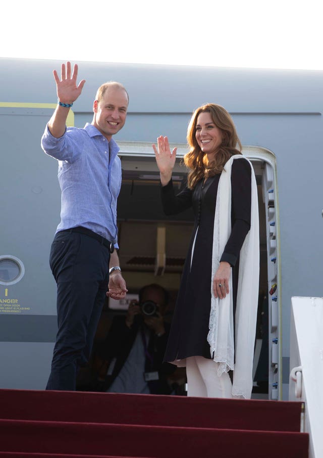William shows his friendship bracelet from the village as they left Pakistan on Friday (Ian Vogler/PA Wire)