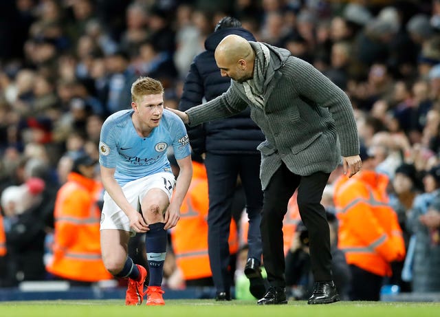 Kevin De Bruyne, left, will be absent for several weeks (Martin Rickett/PA)