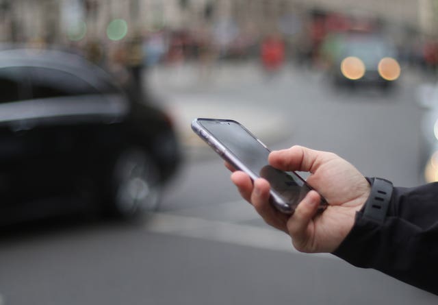 A person holding a smartphone