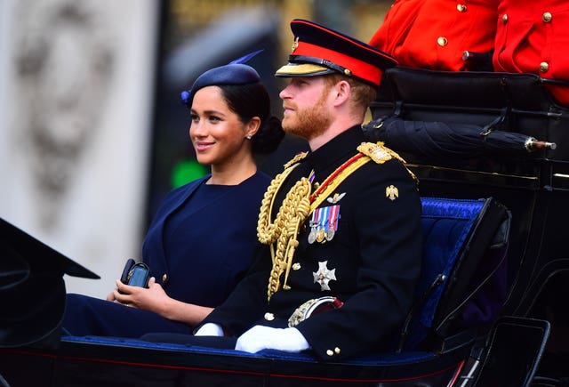 Harry and Meghan make their way to Horse Guards Parade