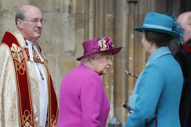 The Dean of Windsor David Conner watches as the Queen and the Princess Royal arrive (Tolga Akmen/PA)