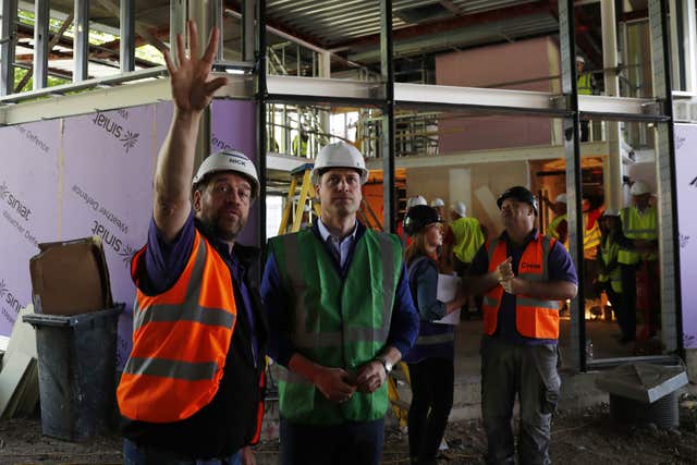 Presenter Nick Knowles gives the duke a tour of the site at Ladbroke Grove (Adrian Dennis/PA)