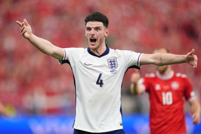 Declan Rice gestures with his arms during England's draw with Denmark