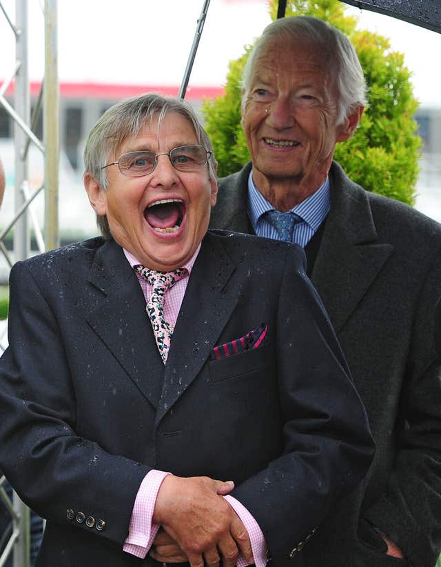 Willie Carson and Lester Piggott share a joke at Doncaster's St Leger meeting