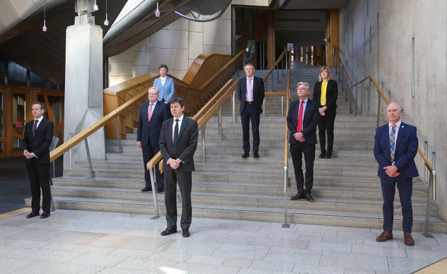 Ken Macintosh MSP Presiding Officer (centre front) with representatives from Scottish parties during a minute’s silence at the Scottish Parliament at Holyrood, Edinburgh 