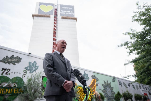 Matt Wrack at the Grenfell Memorial Wall 