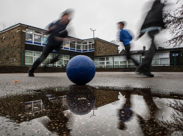 School children play during a break at a primary school in Yorkshire