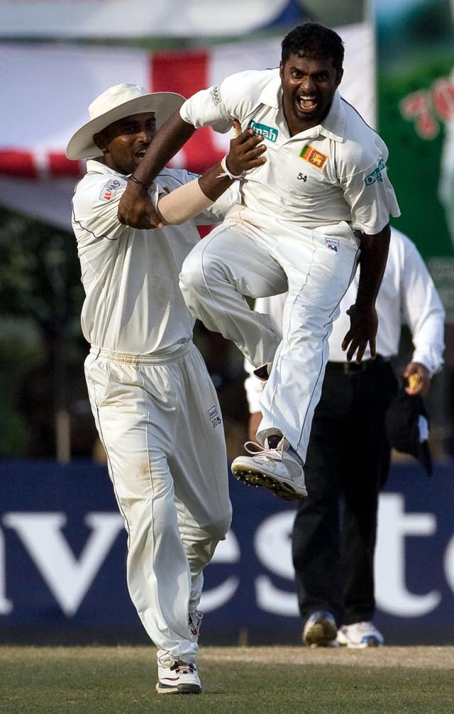 Muttiah Muralitharan (right) is the top wicket-taking in Test history.