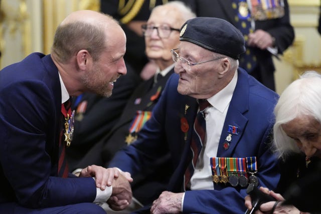 The Prince of Wales with veteran Ron Gumbley