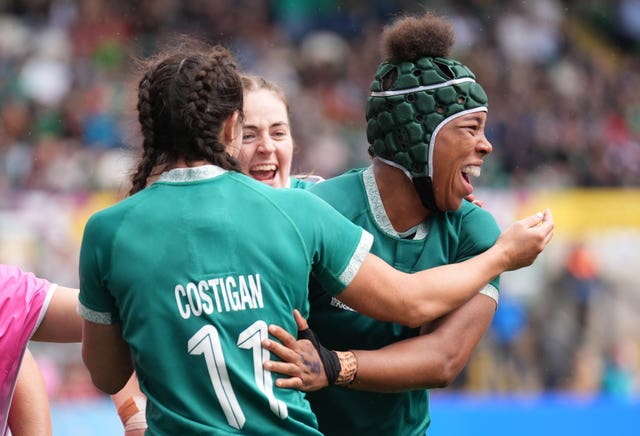 Ireland’s Grace Moore, right, celebrates her first try with fellow scorer Amee-Leigh Costigan