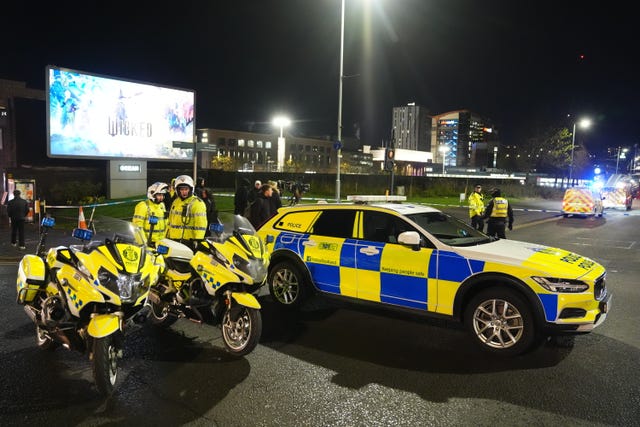 Police vehicles outside the bus station