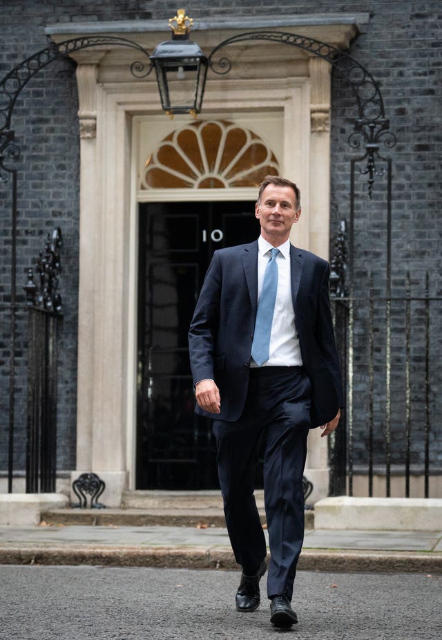 Jeremy Hunt leaves 10 Downing Street in London after he was appointed Chancellor of the Exchequer