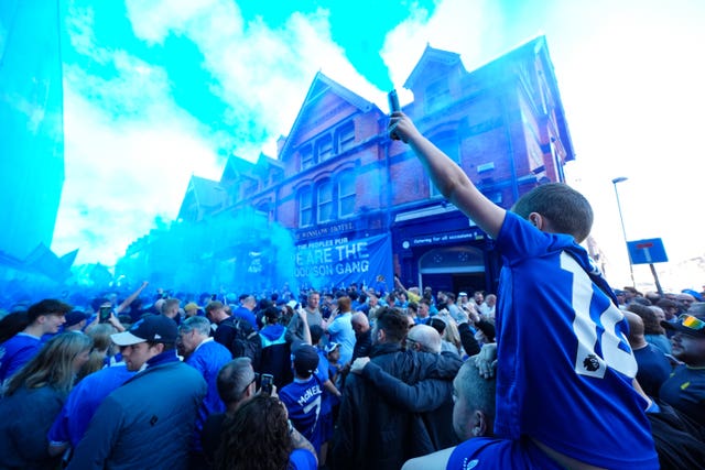 Everton fans let off flares before the Premier League match at Goodison Park