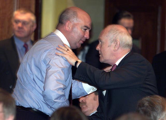 Belfast Ulster Secretary John Reid (R)