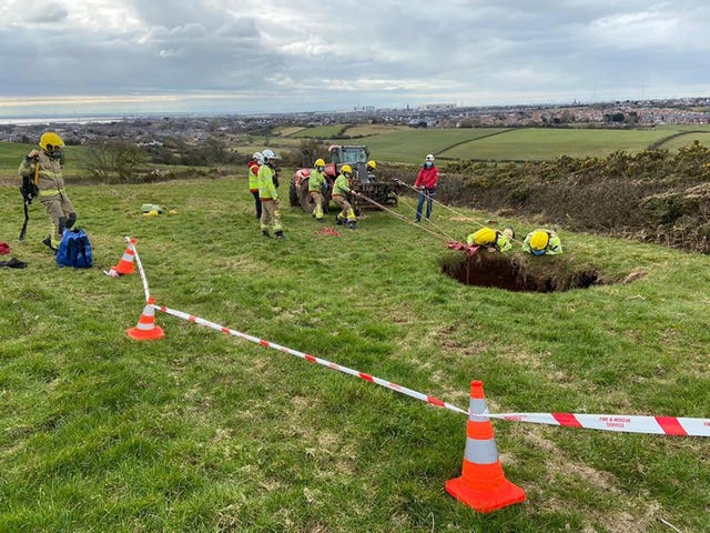 The rescue of a quad biker who fell into a 60ft sinkhole near Barrow-in-Furness in Cumbria 