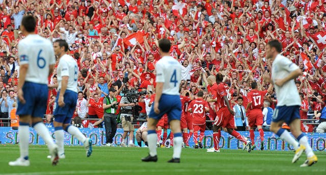 Switzerland celebrate scoring at Wembley (PA)