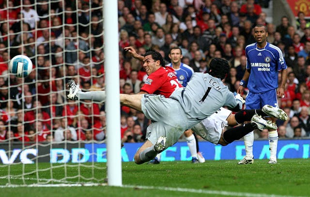Carlos Tevez scores past Petr Cech in a September 2007 league encounter