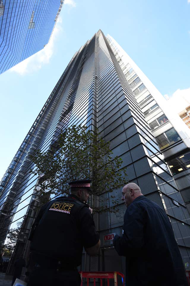 Alain Robert climbs Heron Tower