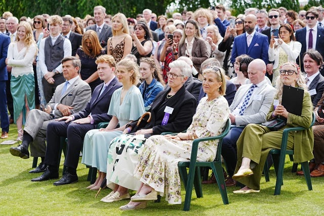 The Duchess of Edinburgh and Lady Louise Mountbatten-Windsor listen to the Duke of Edinburgh's speech at the Palace of Holyroodhouse
