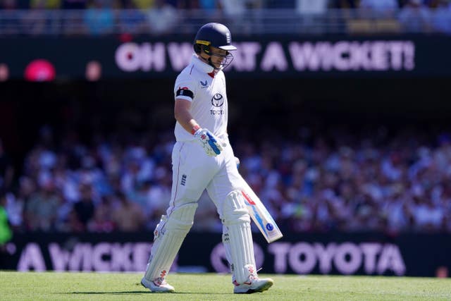 England’s Ollie Pope walks off