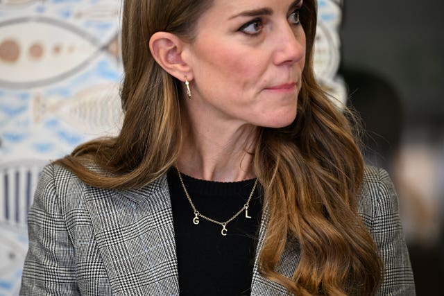 The Princess of Wales wears a necklace with the initials G, C and L