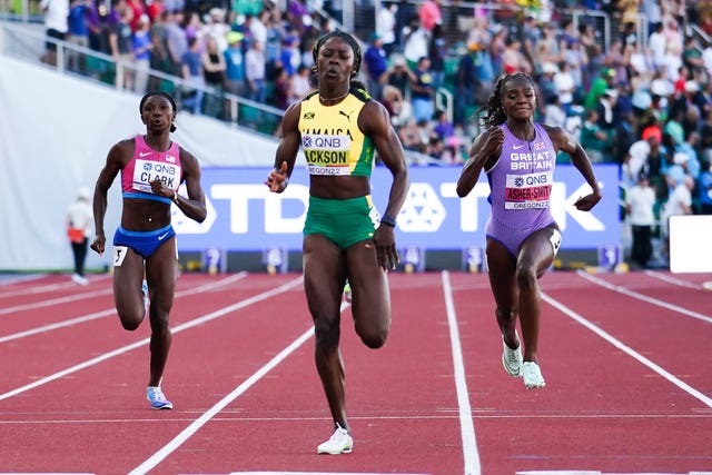 Shericka Jackson, centre, clocked 21.45 seconds en route to winning the 200m at the World Championships on Thursday