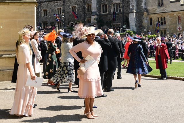 Oprah Winfrey leaves St George’s Chapel at Windsor Castle after Harry and Meghan's wedding (Ian West/PA)