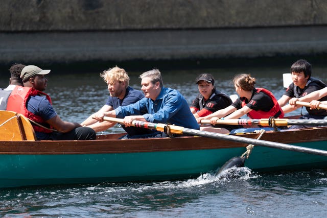 Labour leader Sir Keir Starmer helps to row a boat on the River Lea with young people whilst attending the London Youth Rowing Big Jubilee Lunch at London Olympic Park, on day three of the Platinum Jubilee celebrations for Queen Elizabeth II