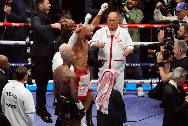 Conor Benn and Chris Eubank at the end of their fight at Tottenham Hotspur Stadium
