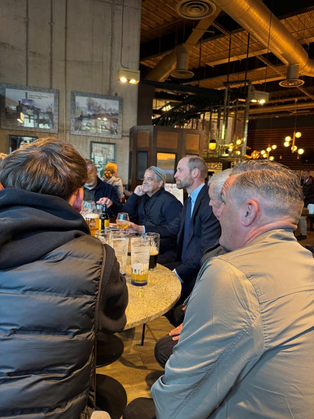 The Prince of Wales meeting Aston Villa supporters in a Wetherspoons pub in the centre of Birmingham ahead of an away match at Everton