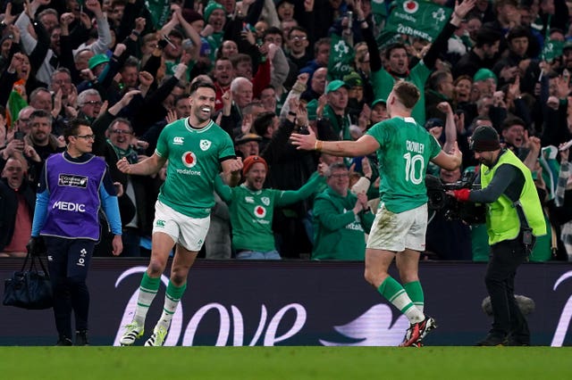 Conor Murray and Jack Crowley celebrate after the final whistle