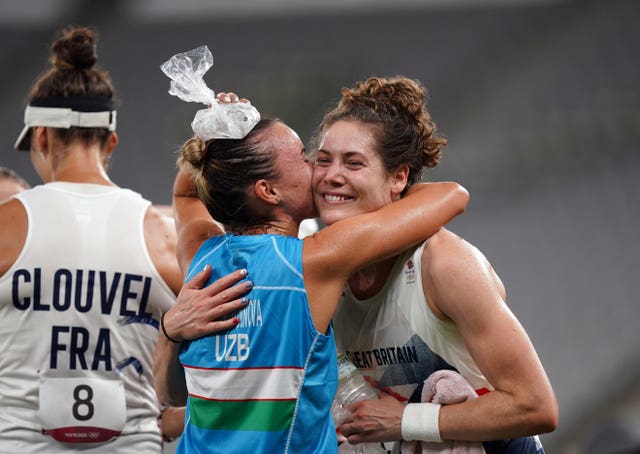 Kate French, right, celebrates winning gold in Tokyo