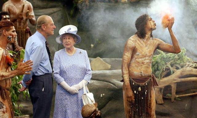 The Queen and Philip watch a culture show at Tjapukai Aboriginal Culture Park, Cairns, Australia in 2002