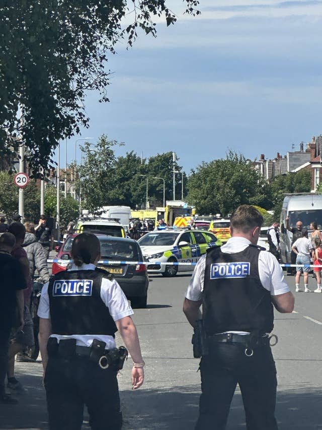 Two police officers at the scene