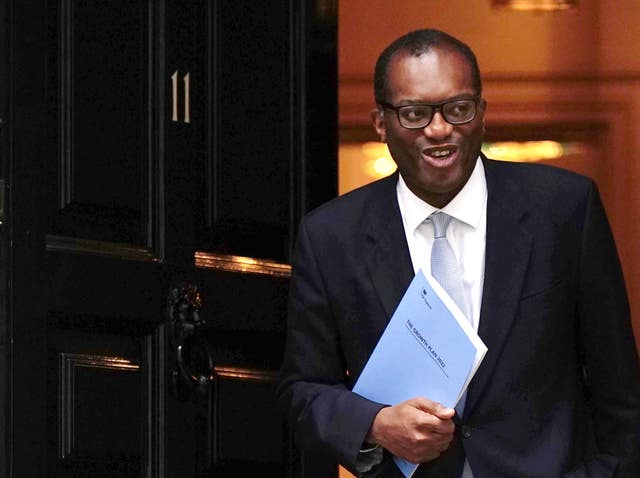 Chancellor of the Exchequer Kwasi Kwarteng leaves 11 Downing Street to make his way to the Treasury Department to deliver his mini-budget on Friday