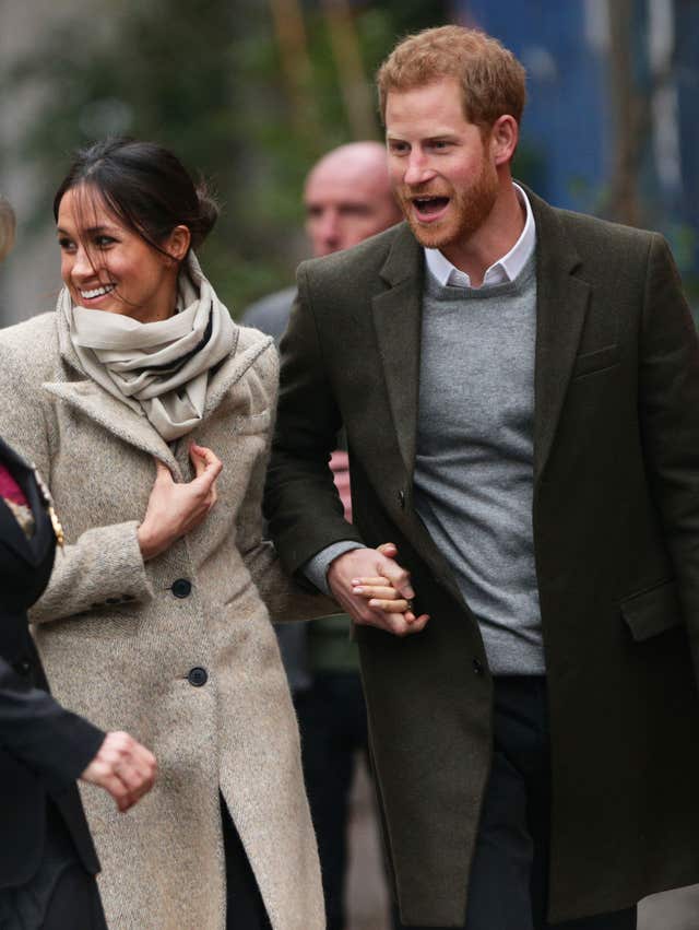 The couple have not been afraid of public displays of affection like holding hands during a trip to Brixton, south London (Yui Mok/PA)