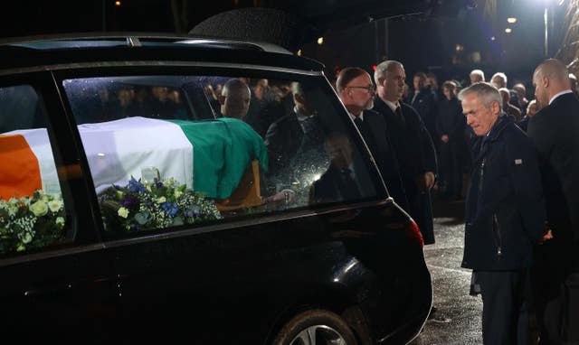 The coffin of former taoiseach John Bruton arriving at St Peter and Paul’s Church in Dunboyne