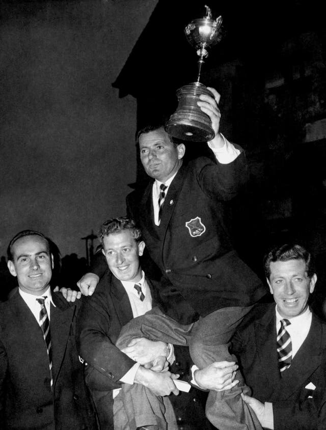 Dai Rees, who also captained the 1955 team, lifts the Ryder Cup after victory in Sheffield in 1957
