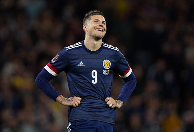 Lyndon Dykes rescues Scotland with late winner to put play-off spot in sight
