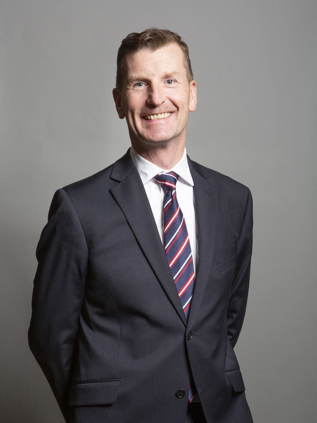 David Doogan smiles in official parliamentary photo