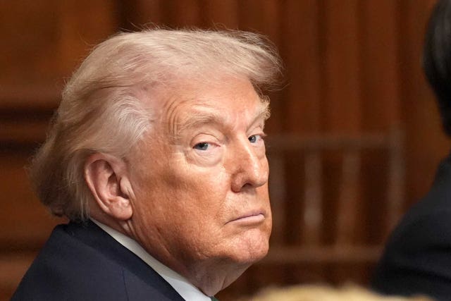 Side view headshot of Donald Trump