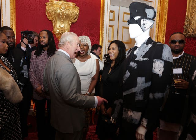 Charles greets guests during a reception for the Nigerian diaspora