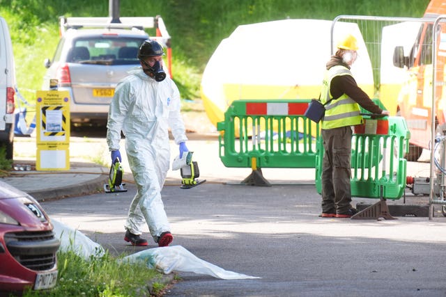 Workers at the scene of the fire