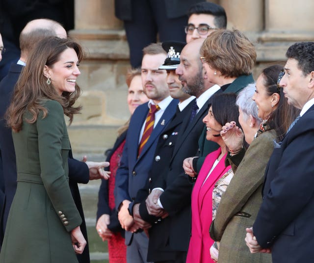 The duke and duchess were greeted by a number of representatives from the local community (Danny Lawson/PA)